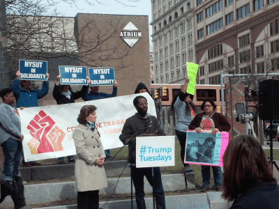 Aly Wane speaking at an event hosted Tuesday by Syracuse mayor Stephanie Miner to fight Trump's orders on immigration. / Photo courtesy of Aly Wane
