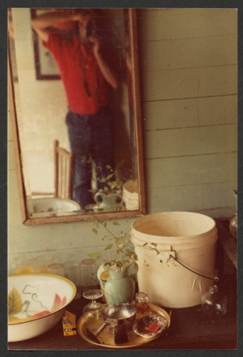 A self-portrait of Robert Lynch in a mirror.