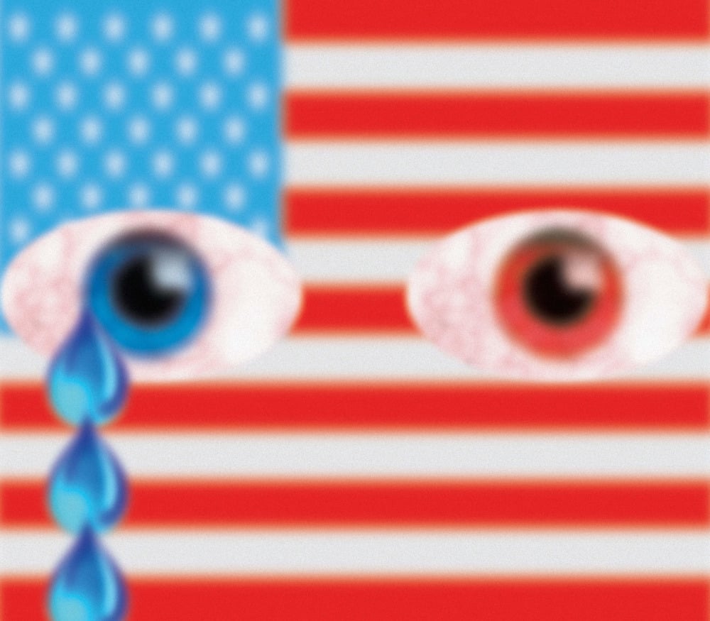 An anthropomorphized American flag has two eyes, one red and one blue. The leftmost eye, the blue eye, is crying.