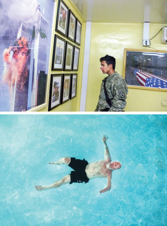 TOP: A soldier looks at framed photographs hanging on a wall. Closest to the viewer is a large photograph of the explosion that occurred when the second jetliner crashed into the Twin Towers. A photograph of American military coffins being transported home hangs on the far wall behind the soldier. BOTTOM: A man suffering from severe burn injuries floats on his back in a pool.