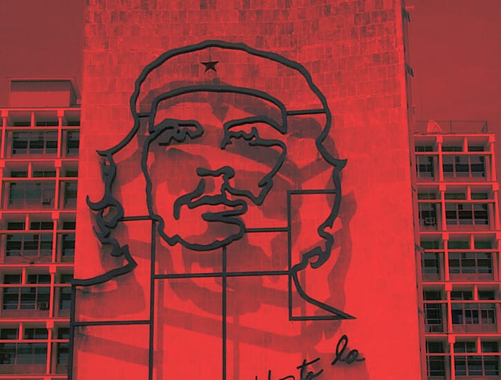 A portrait of Che Guevara on the side of a building in Havana Cuba.
